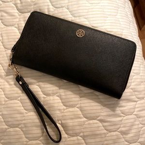 Tory Burch Wristlet. Black. Large enough for all cell phones. Holds a lot